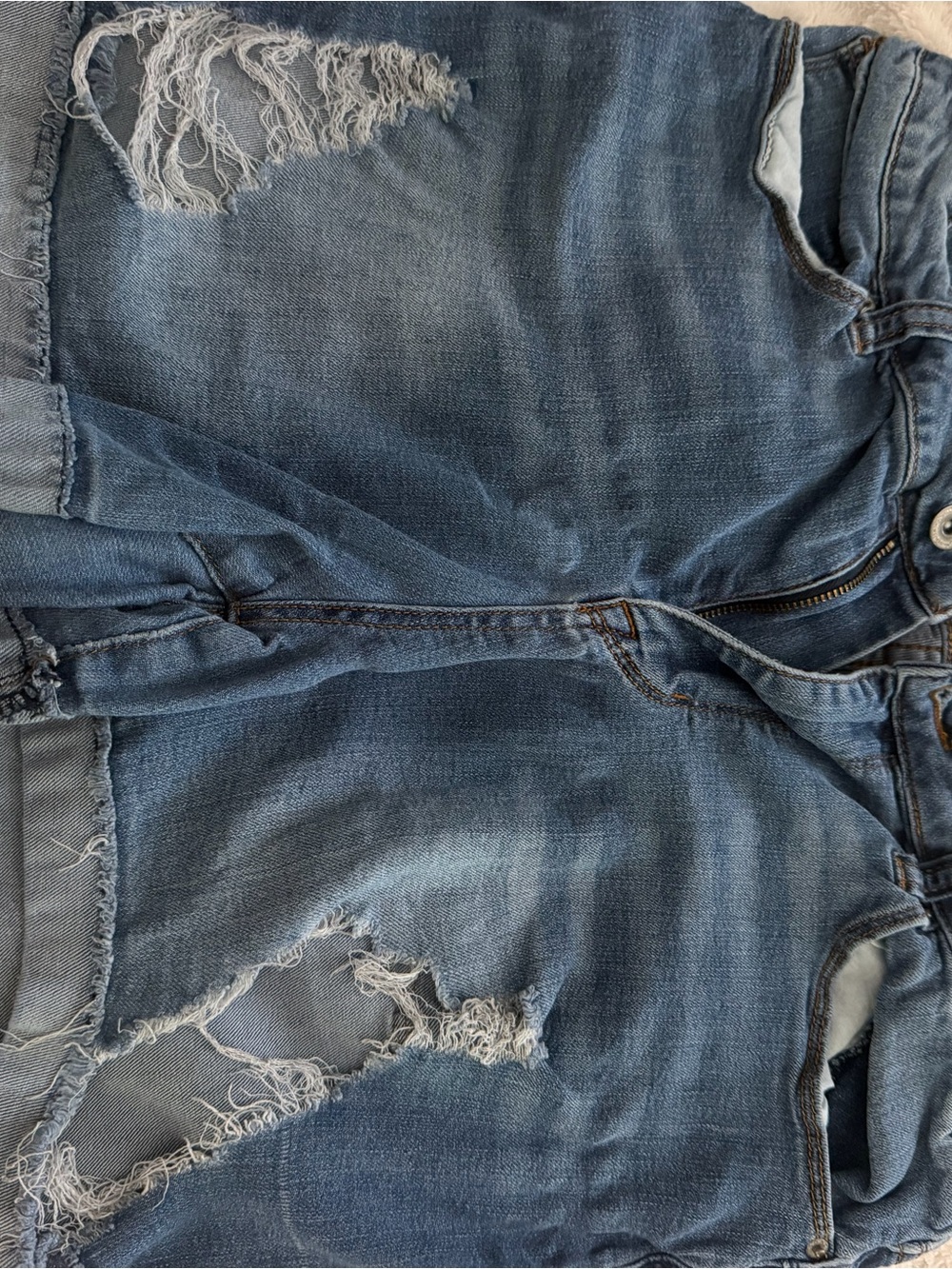 High-Waist Distressed Denim Shorts in Blue